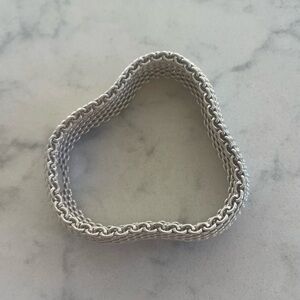 TIFFANY SOMERSET flexible mesh bracelet. 
Perfect condition includes box.